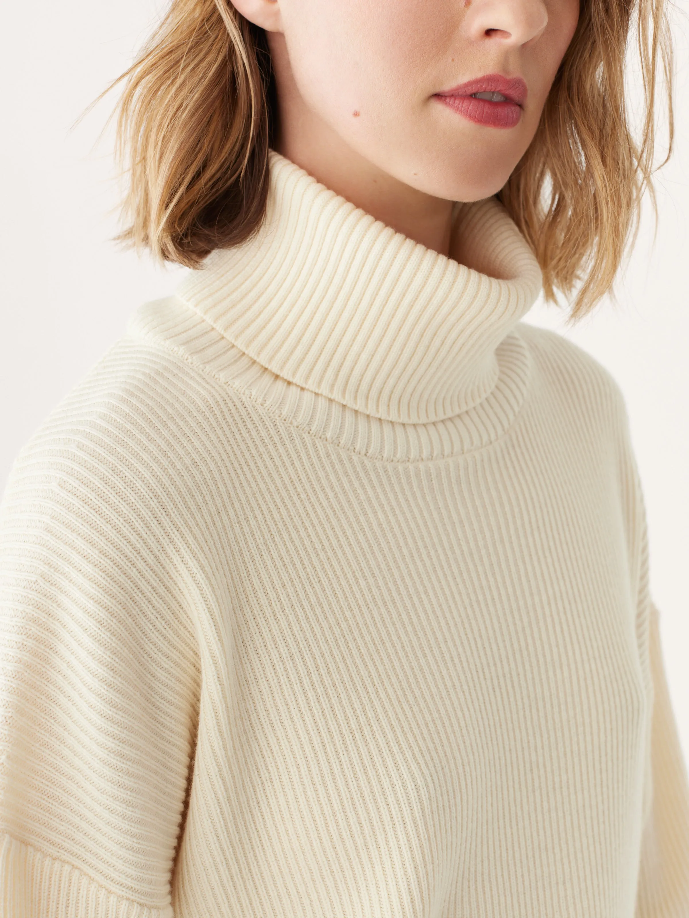 The Merino Turtleneck Sweater in Off White